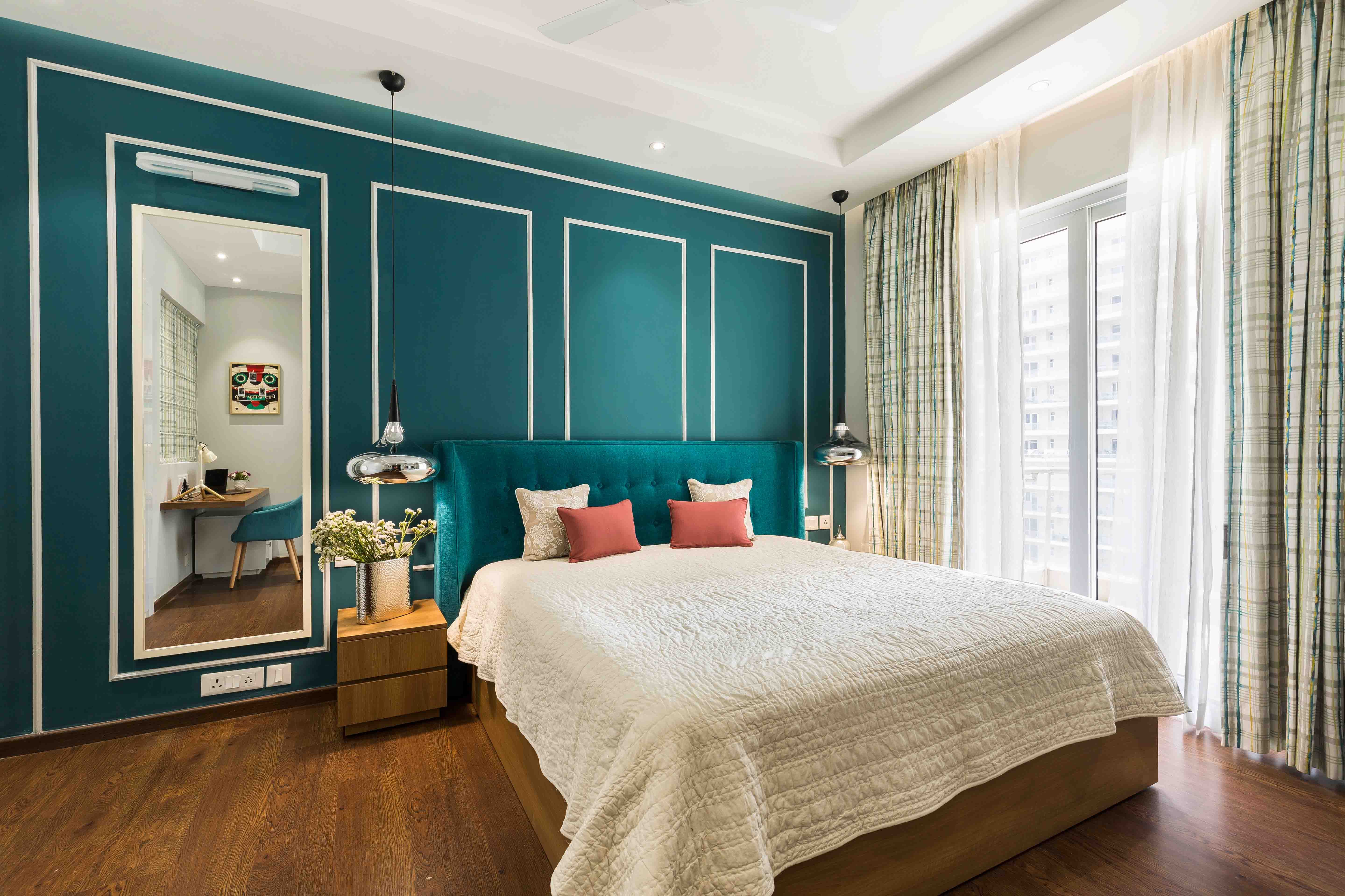 Modern Master Bedroom Design With Teal Blue Accent Wall And White Wall Trims