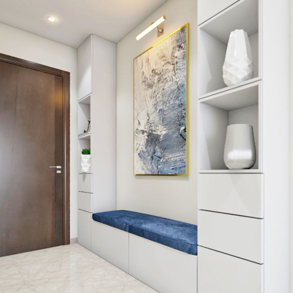 Modern White Foyer Design With Floor-To-Ceiling Storage Unit And Blue Seater
