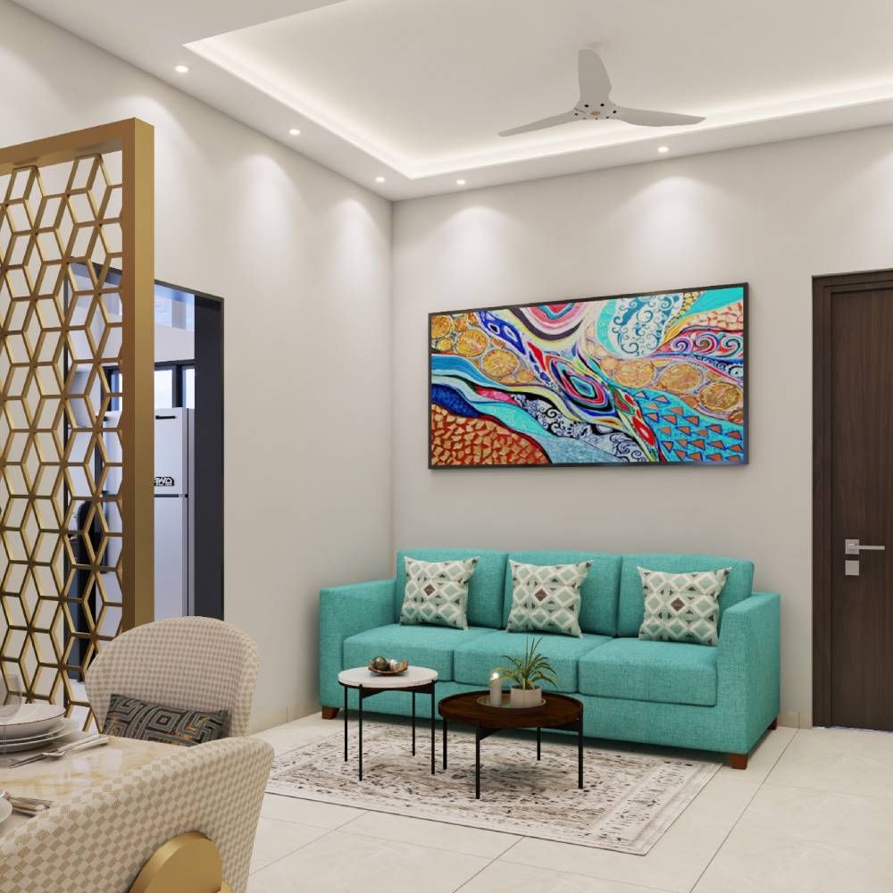 Modern Living Room Design With 3-Seater Light Blue Sofa And Colourful Artwork