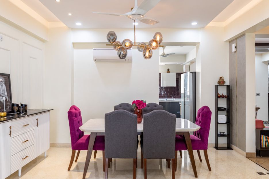 Contemporary Dining Room Design With Purple And Grey Upholstered Chairs