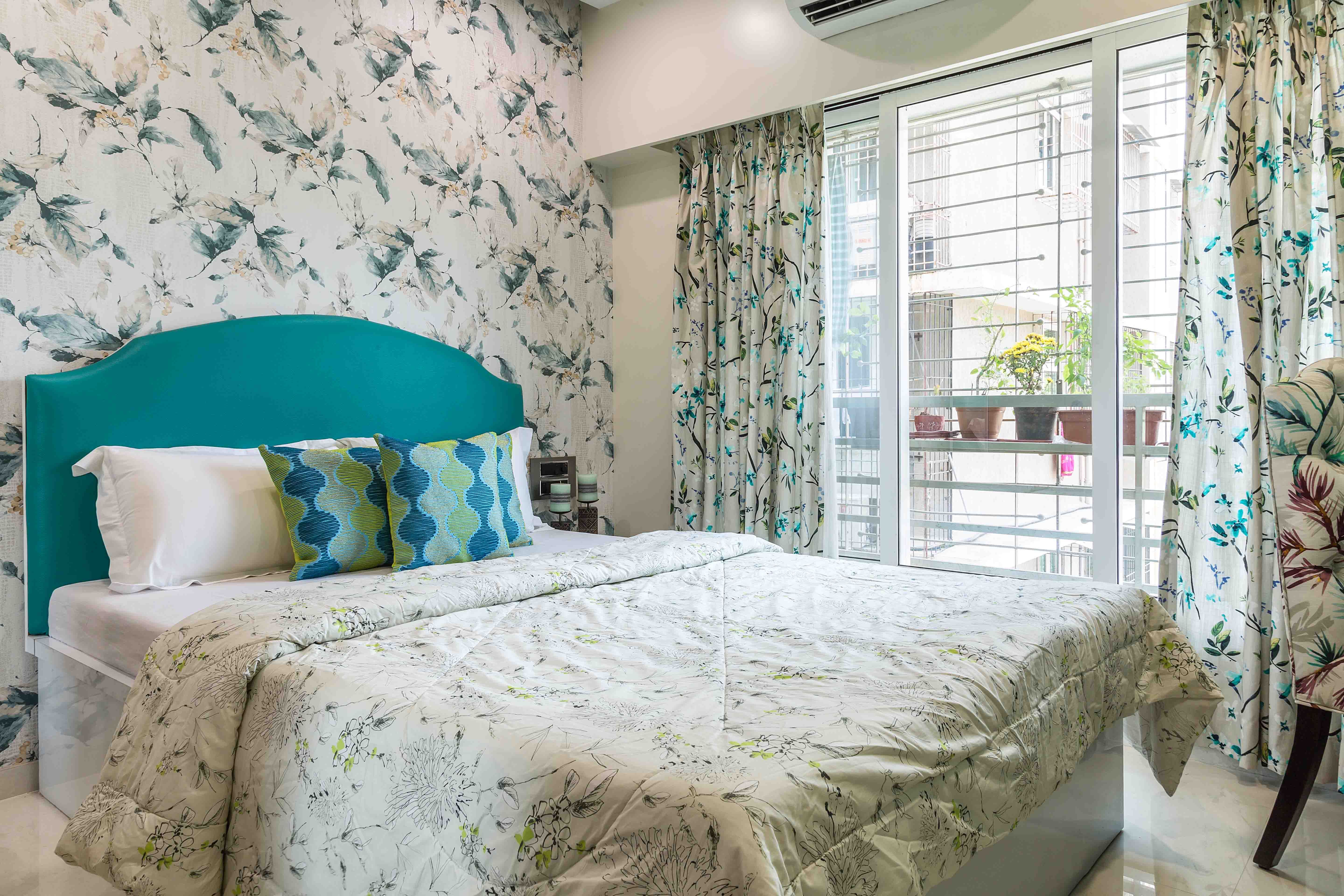 Contemporary Guest Room Design In Blue And White With Leafy Wallpaper
