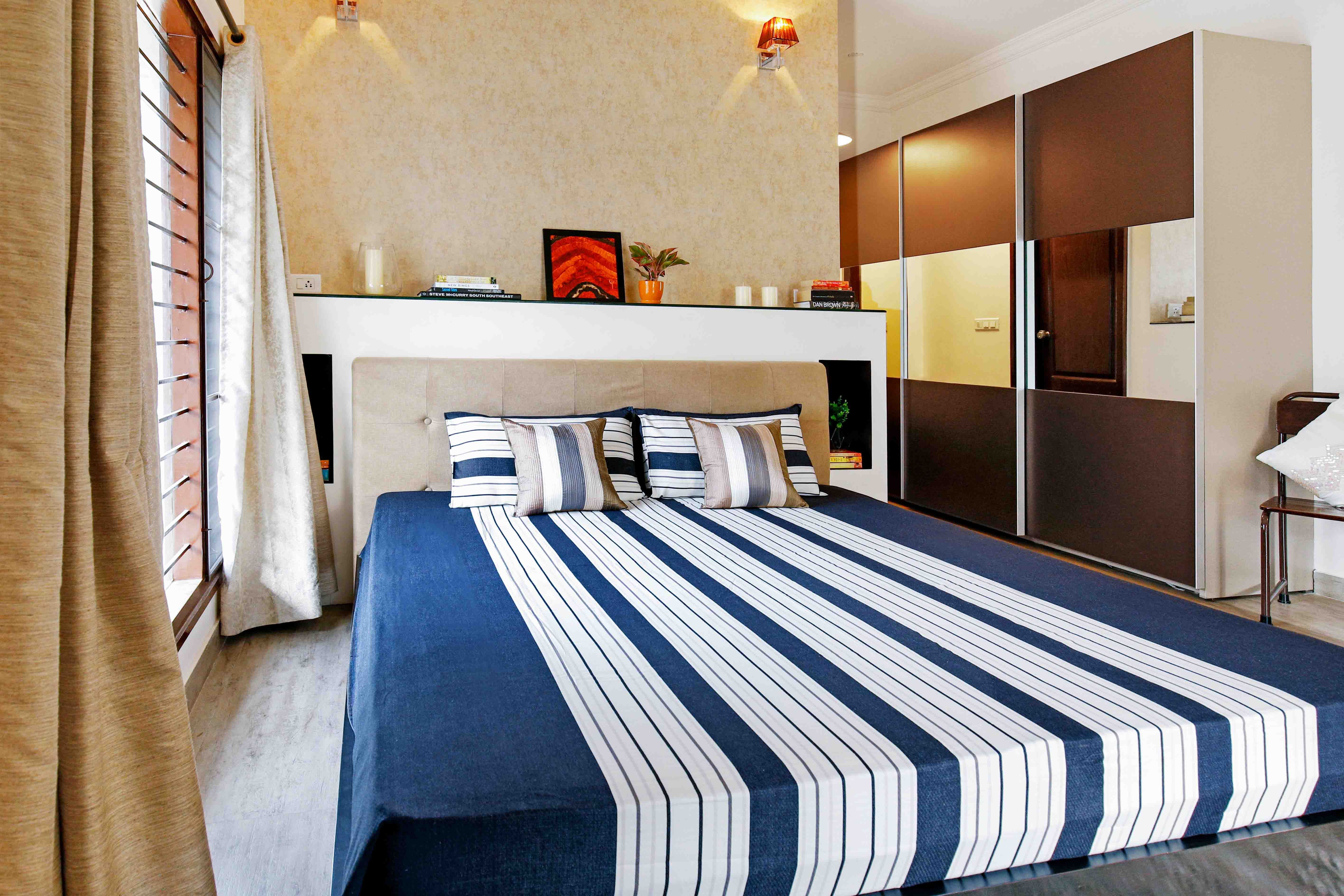 Modern Guest Room Design With 3-Door Brown Sliding Mirrored Wardrobe