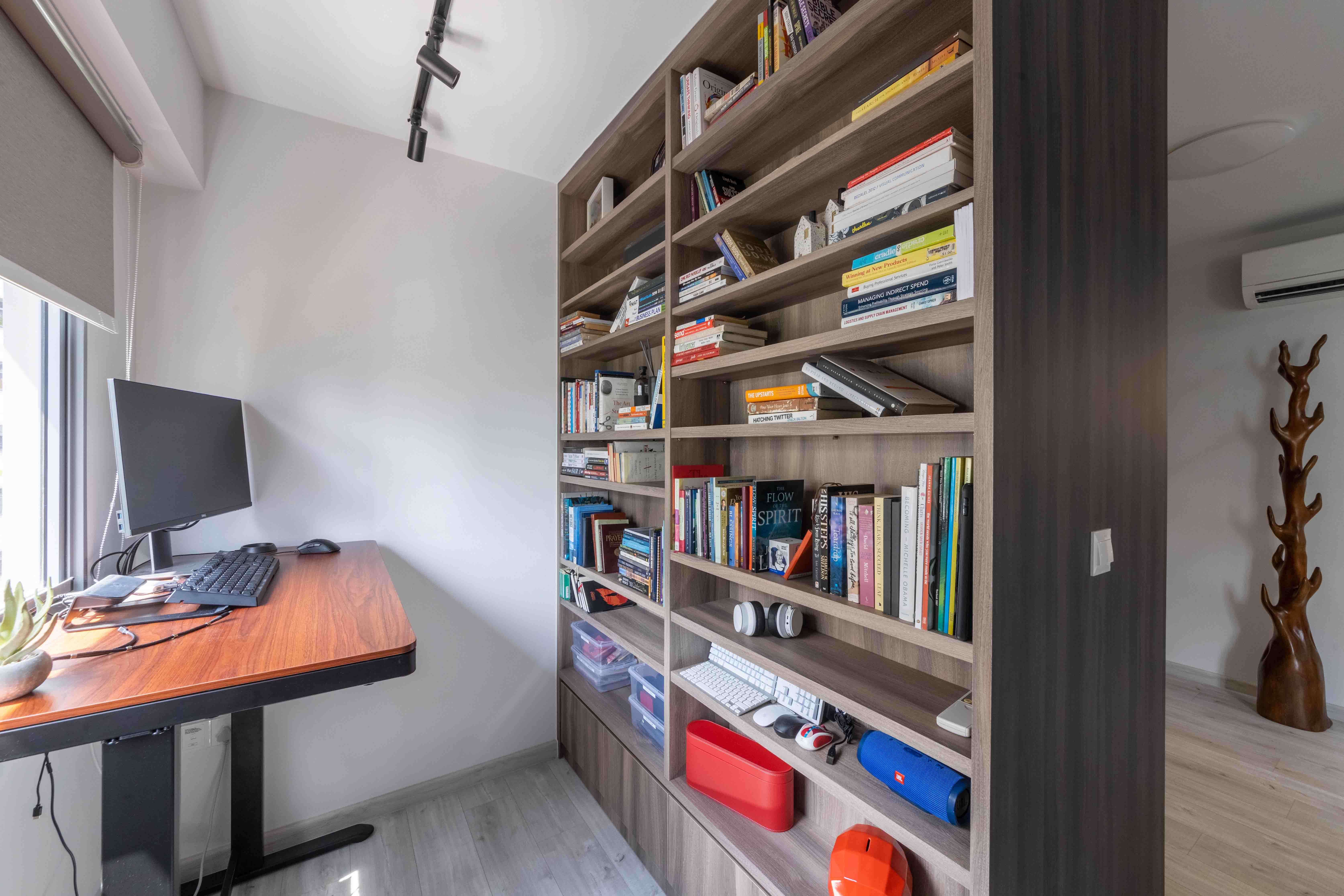 Home Office Design With Large Bookshelf | Livspace