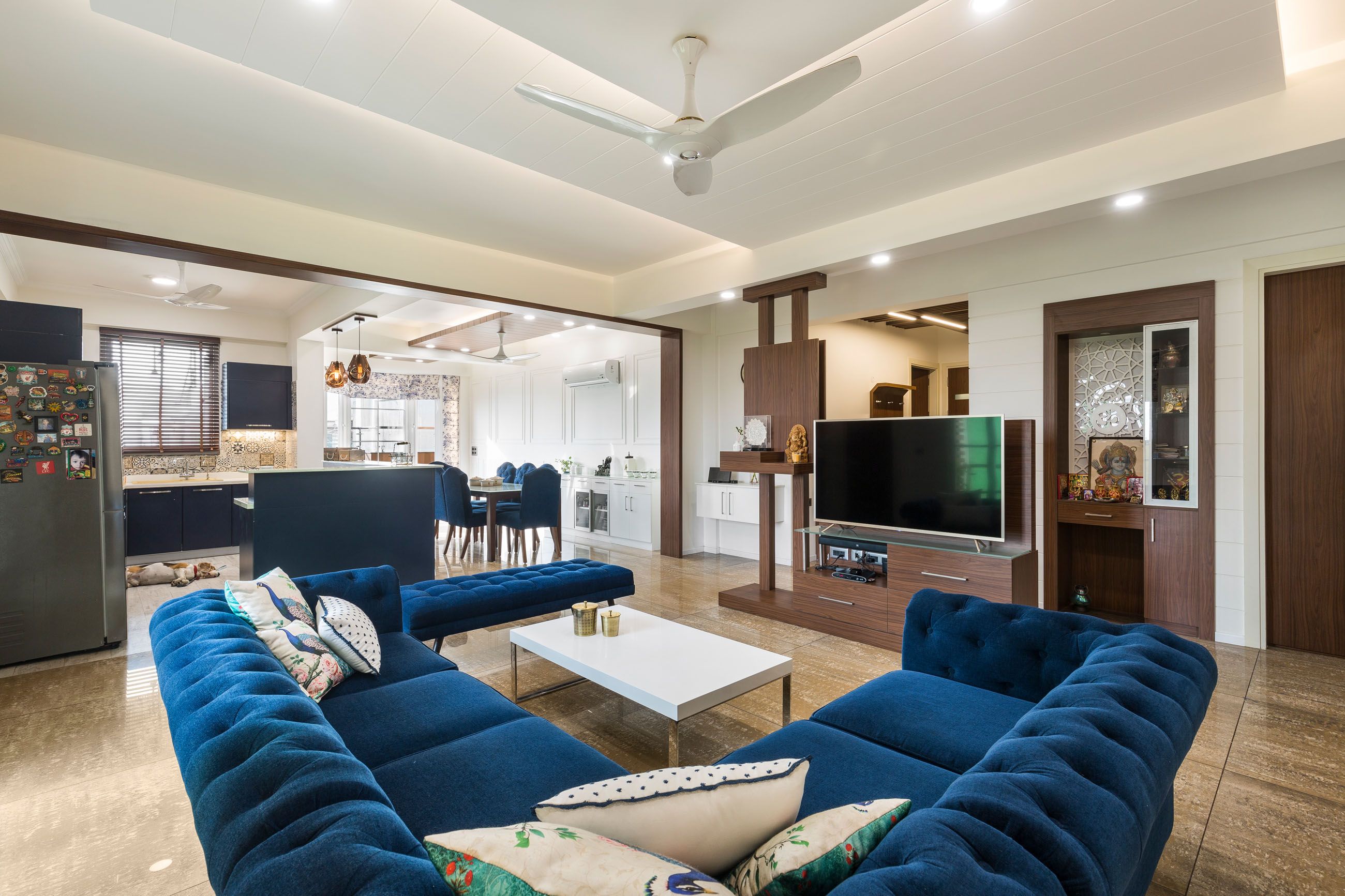 3-BHK Flat In Noida With U Shape Blue Living Room Design | Livspace