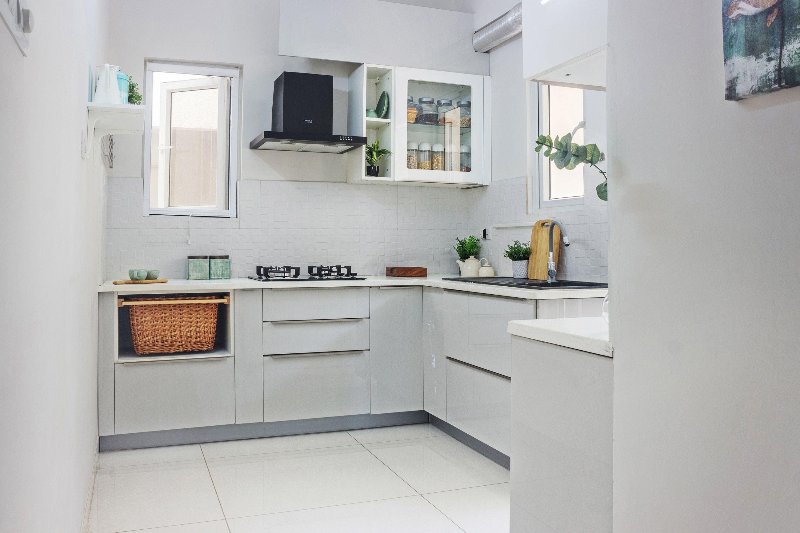 Minmal Frosty White L Shaped Modular Kitchen Design With Mosaic Backsplash