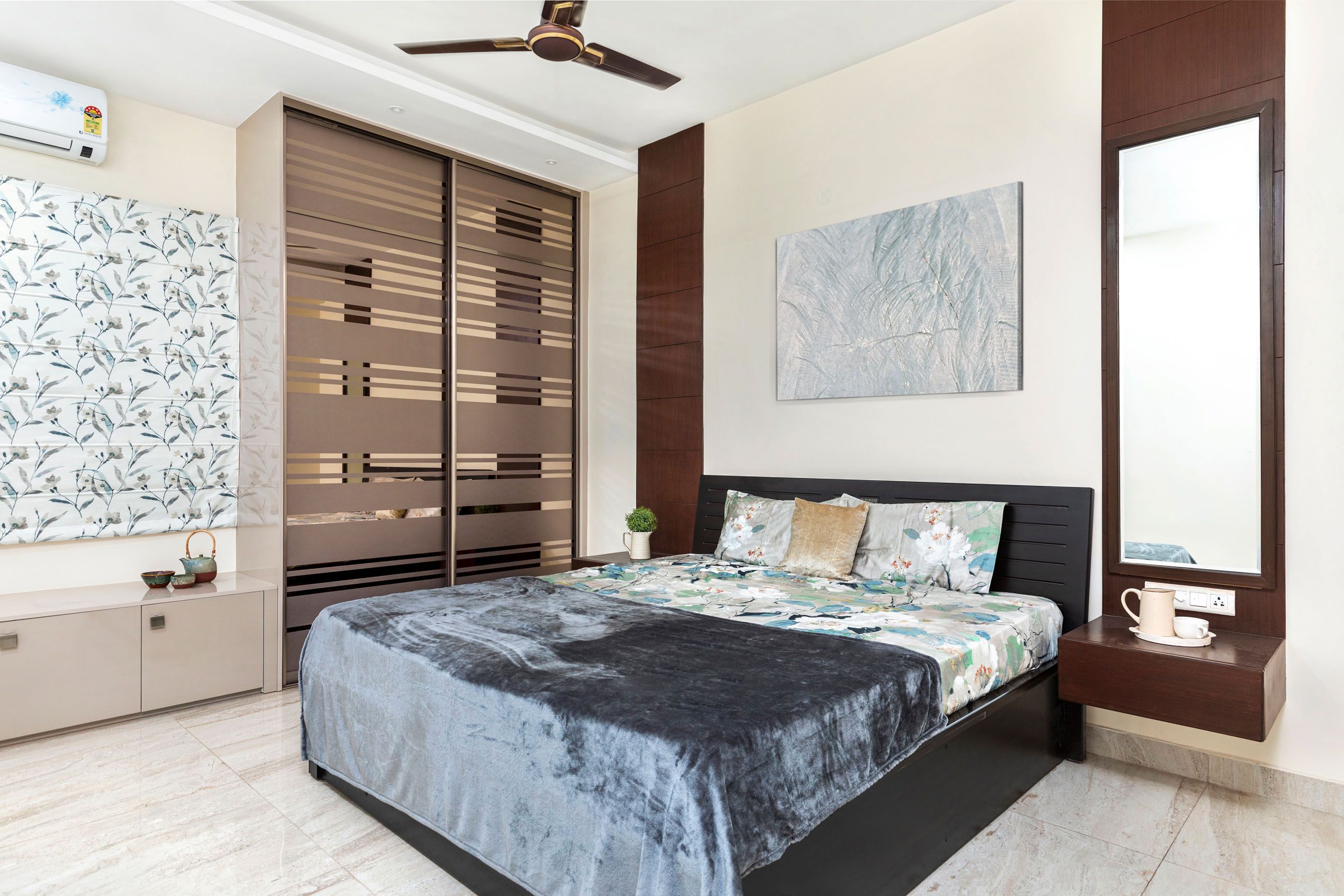 Modern Master Bedroom Design With Brown And Glass Shutter Wardrobe