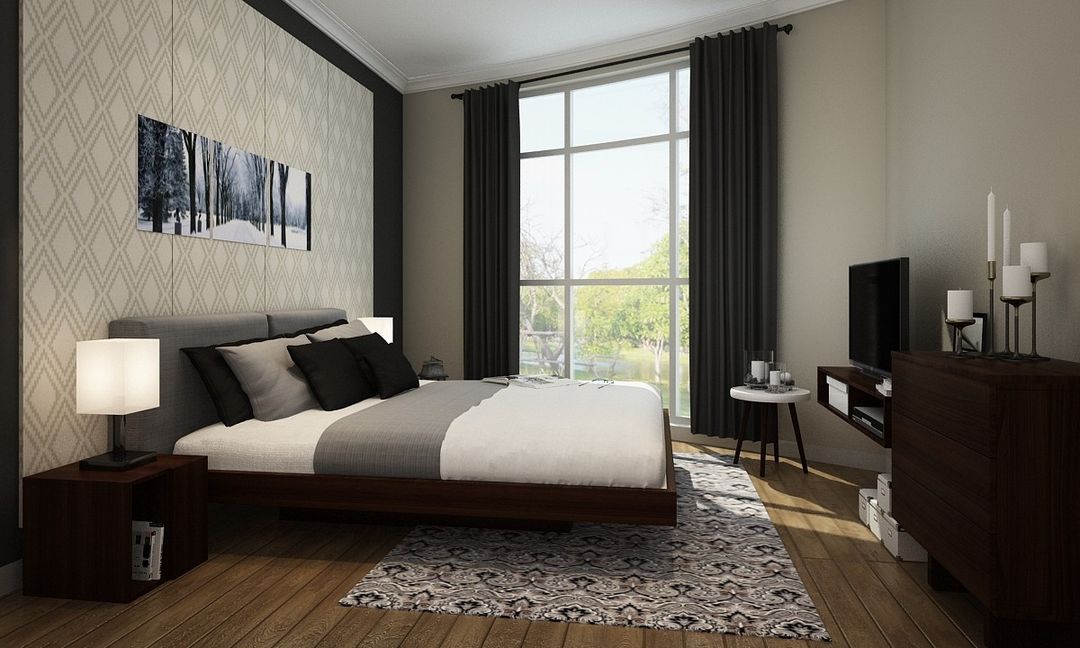 Spacious Bedroom Design With Geometric Patterned Wallpaper | Livspace