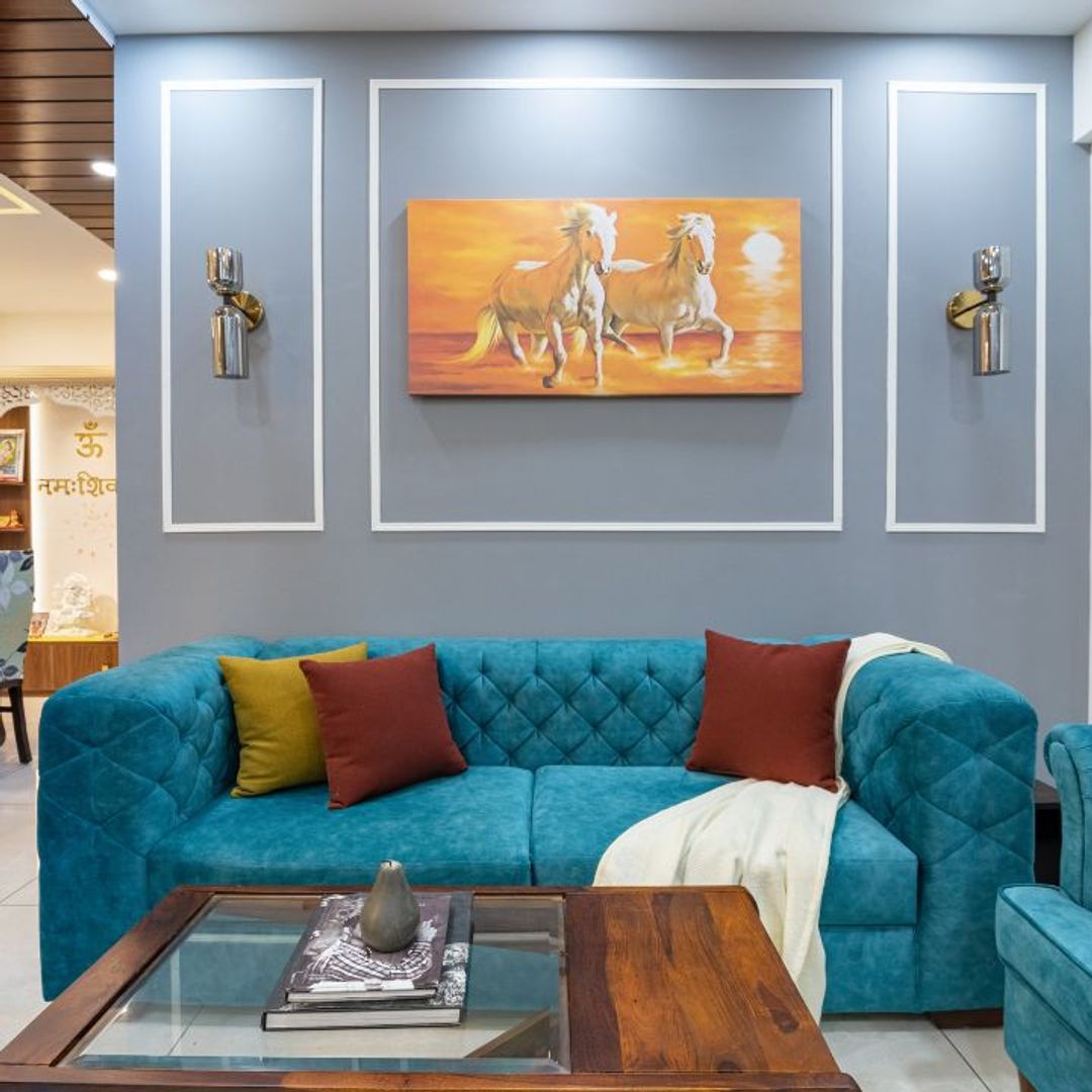 White And Blue Living Room Wall Paint With Wall Trims | Livspace