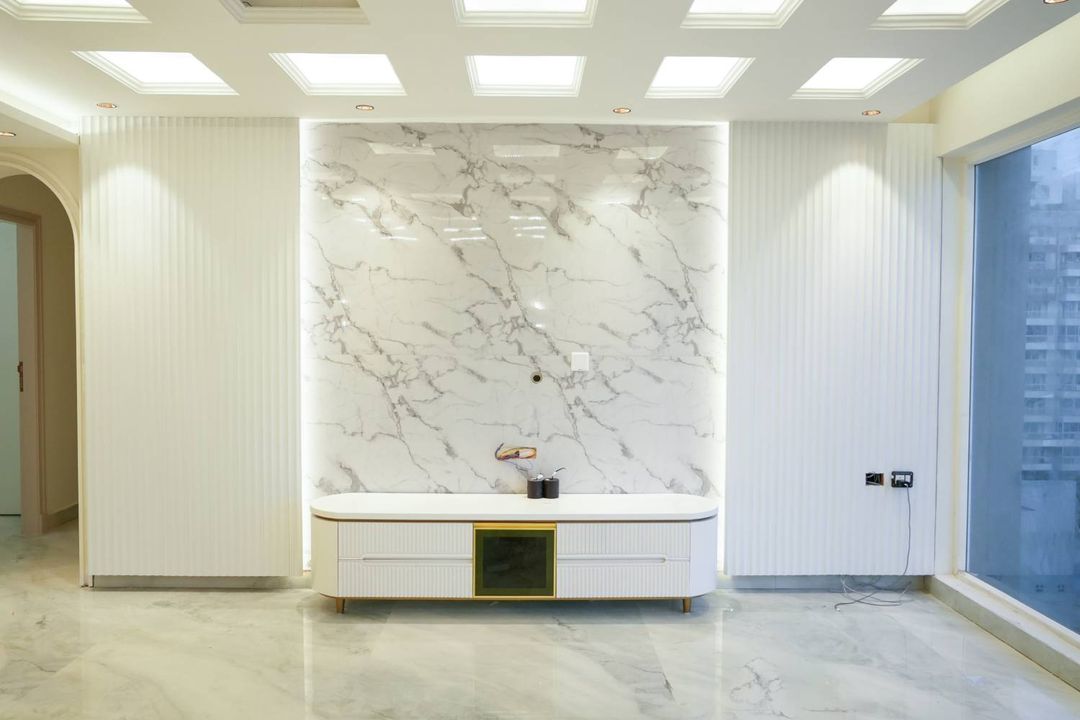 Marble Wall Panel Design with Modern Ribbed White Backdrop | Livspace