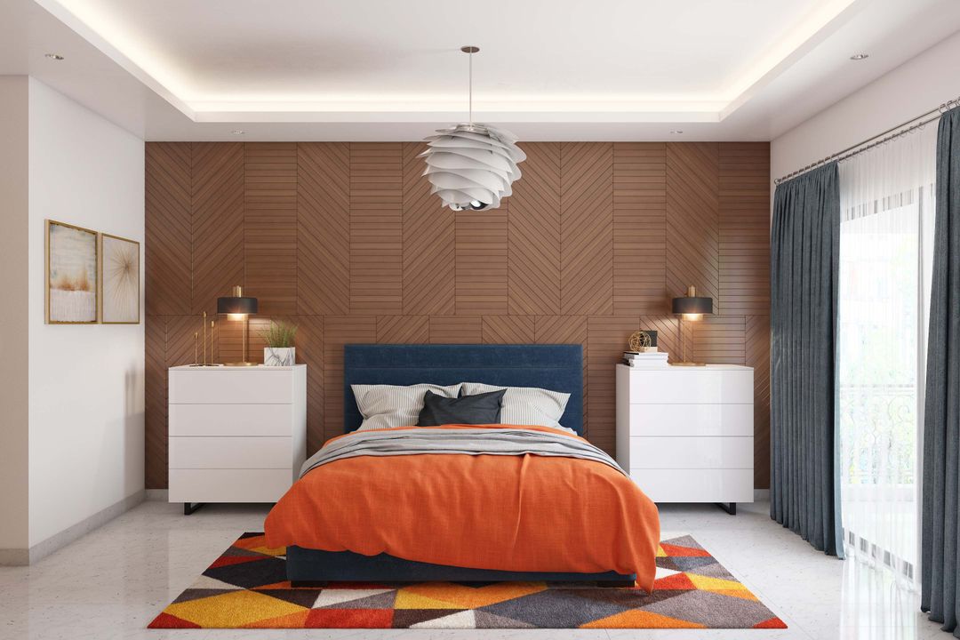 Spacious Master Bedroom Design With Wood Panelled Accent Wall | Livspace
