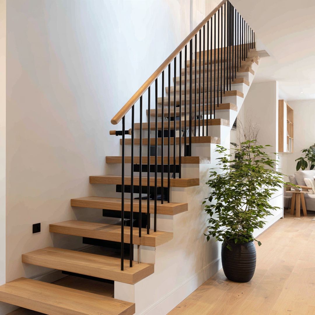 L-Shaped Modern Staircase Design with Wooden Finish | Livspace