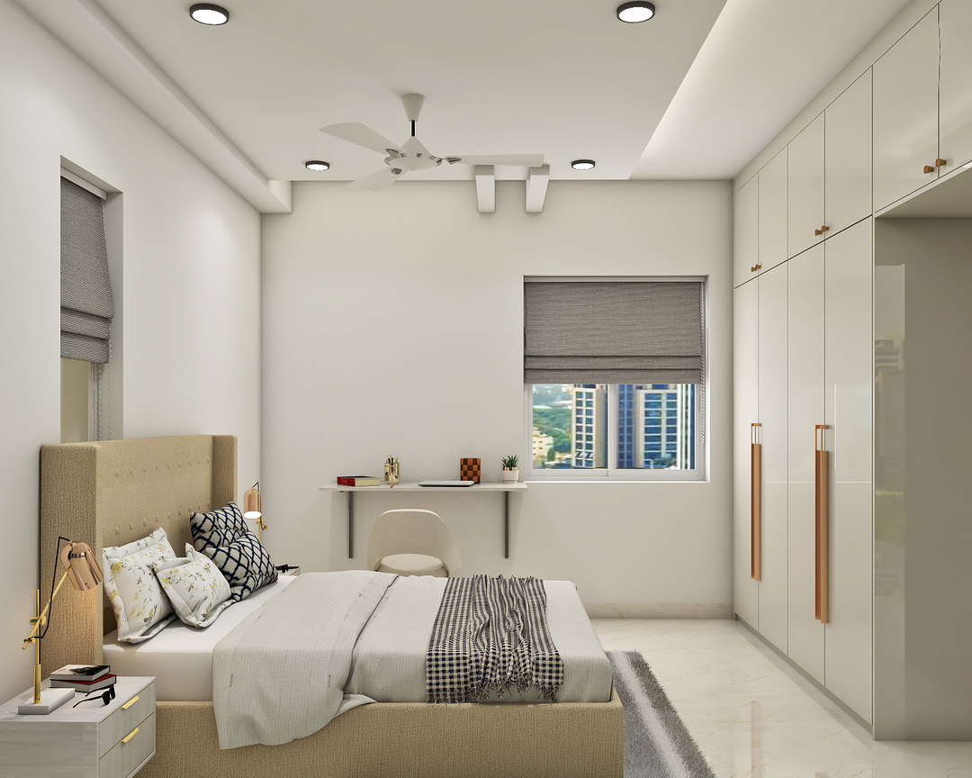 Spacious Guest Bedroom Design With Wardrobe And Desk | Livspace