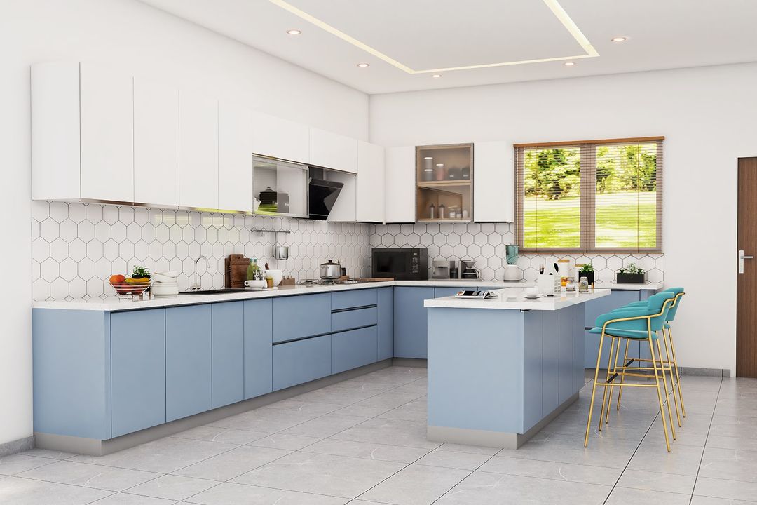 Modern Blue And White Open Kitchen Design With Breakfast Table | Livspace