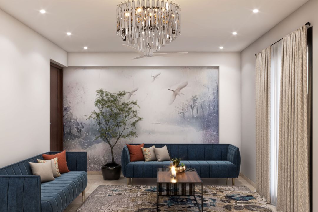 Spacious Living Room Design With Blue Sofas | Livspace