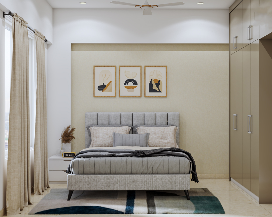 Spacious Master Bedroom Design With Grey Bed And Beige Interiors | Livspace