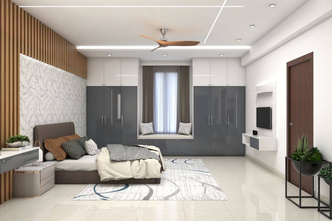 Spacious Master Bedroom Design With Fluted Wooden Panels | Livspace