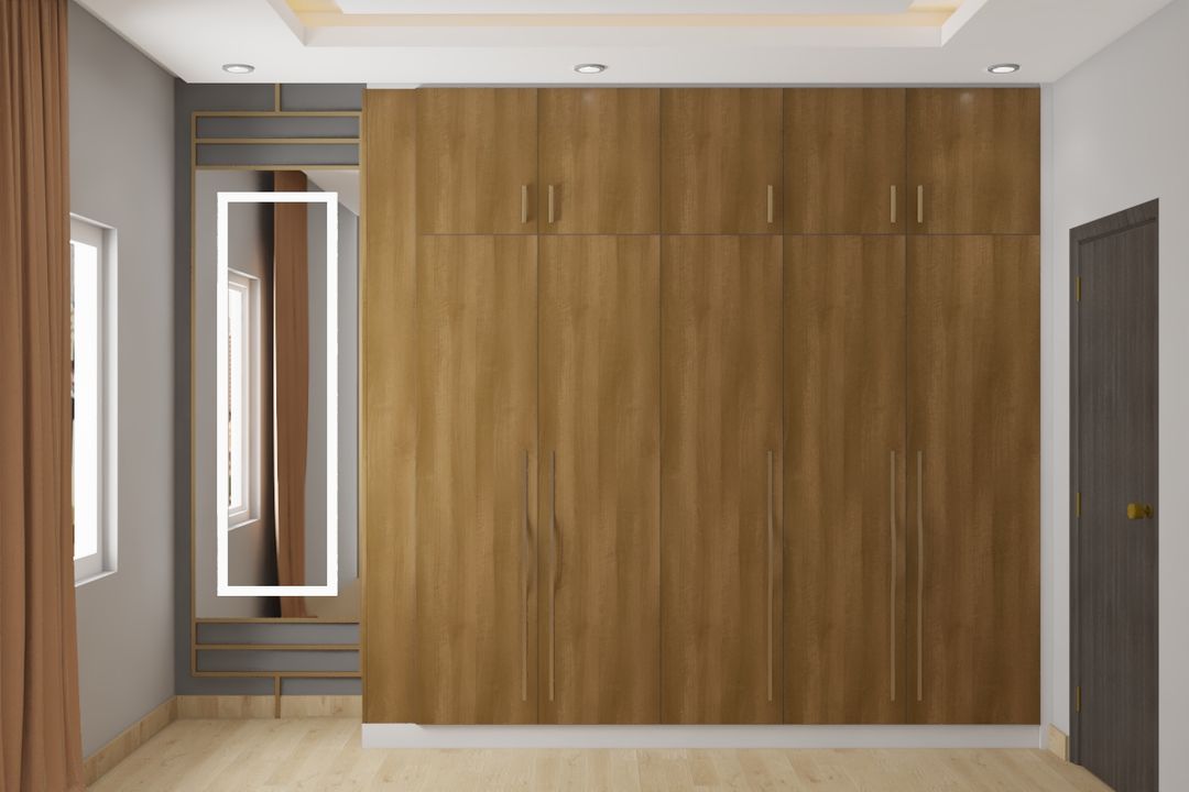 Modern Spacious Ceiling-Touch Wardrobe Design | Livspace