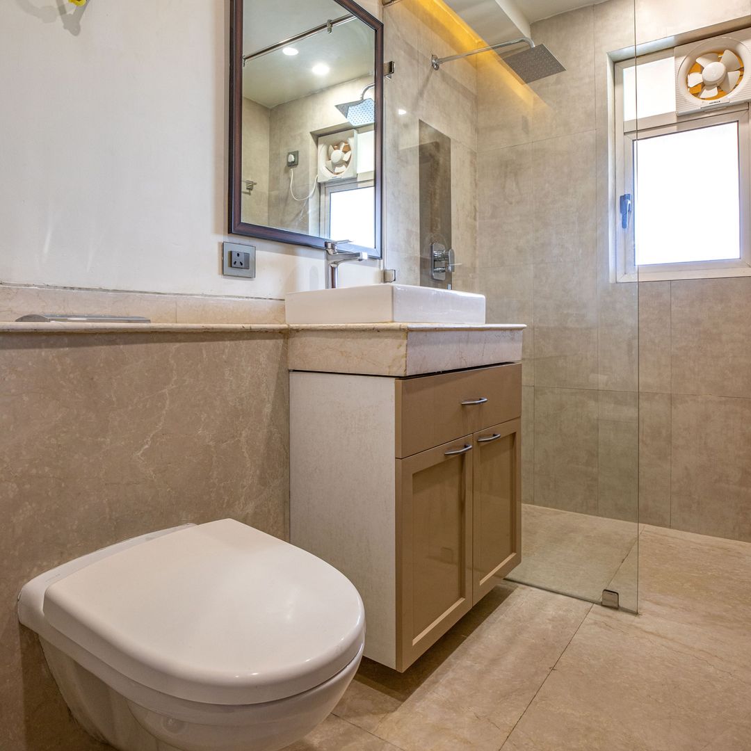 Small Beige Bathroom Design With Wooden Rectangular Mirror | Livspace