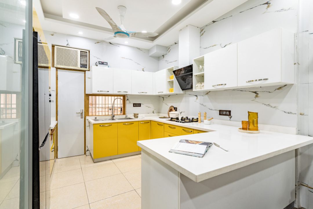Modular Kitchen Design With White Marble Dado Tiles | Livspace