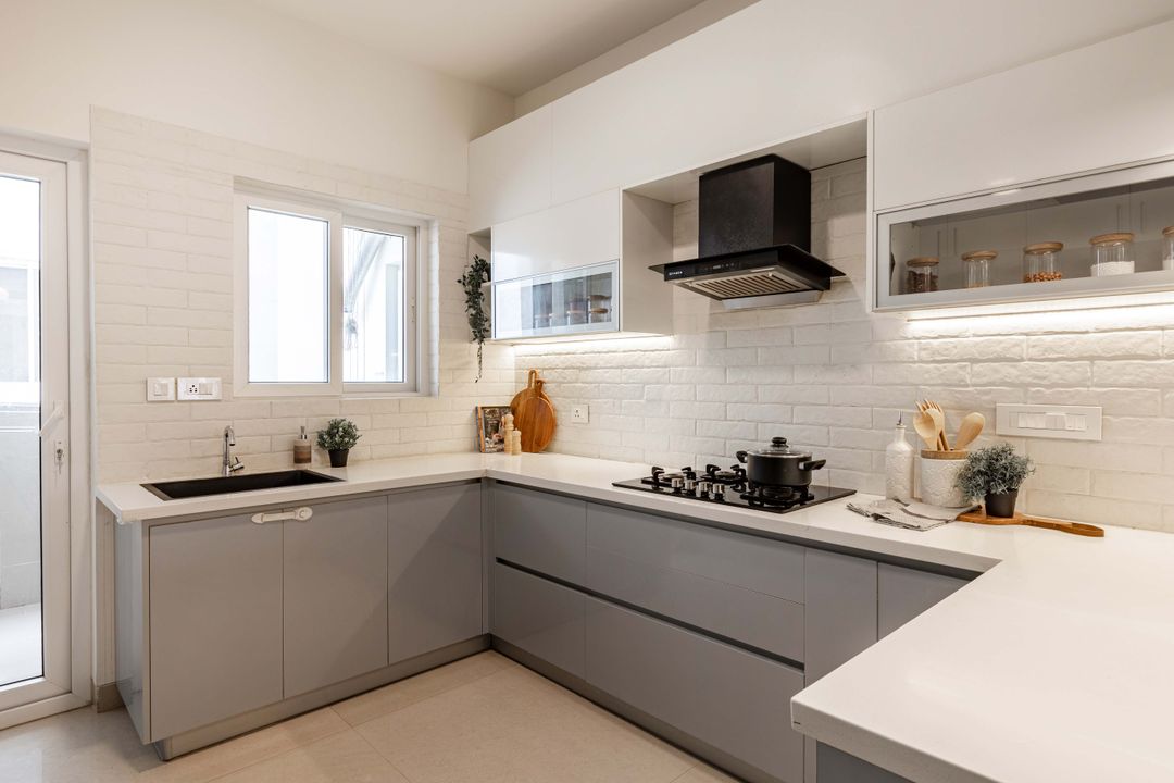 Spacious Modular Kitchen Design With Grey And White Storage Cabinets ...