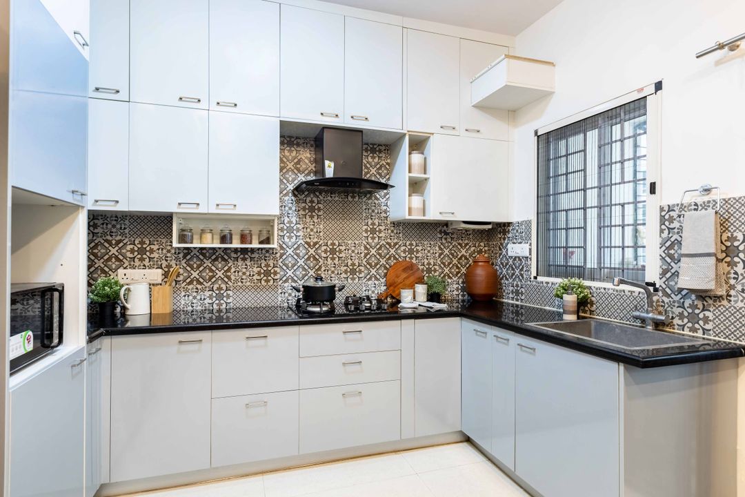 Spacious Modular Kitchen Design With Light Blue And White Storage Units ...