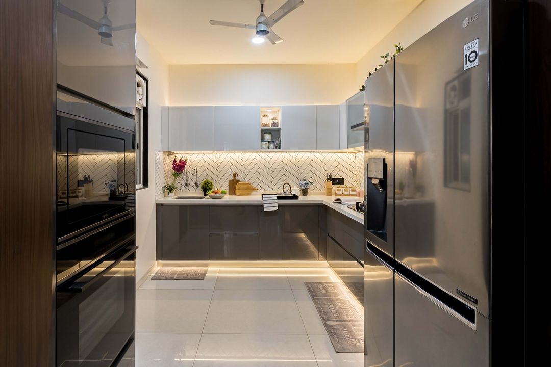 Modular L-Shaped Kitchen Design With Black And White Cabinets | Livspace