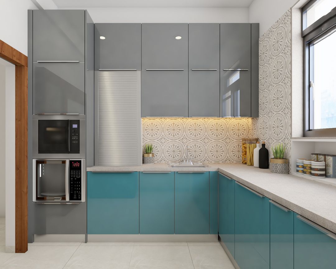 Spacious Kitchen Design With White Quartz Countertop | Livspace