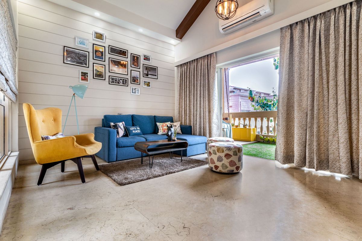 Low-Maintenance Light Grey Living Room Tile Design | Livspace