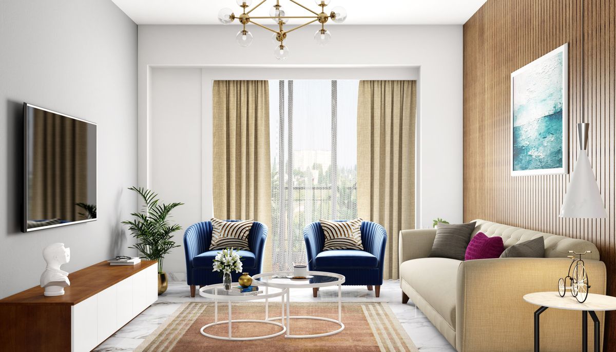 Spacious Living Room Design With Beige And Blue Seating | Livspace