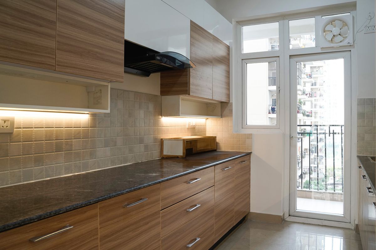 Parallel Wood and White Kitchen Design with Wood Cabinets and Granite ...