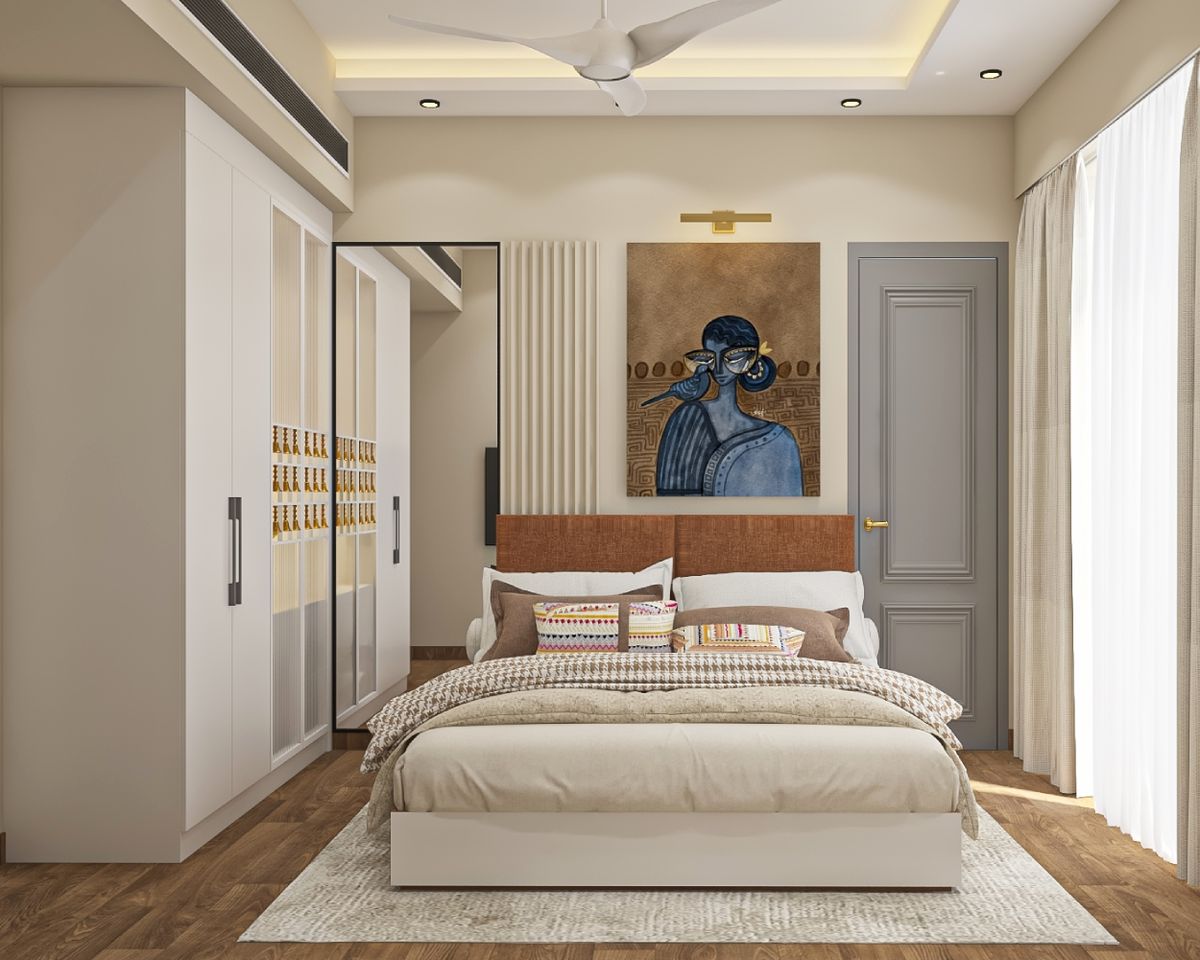 Spacious Guest Bedroom Design With Brown Bed And Swing Wardrobe | Livspace