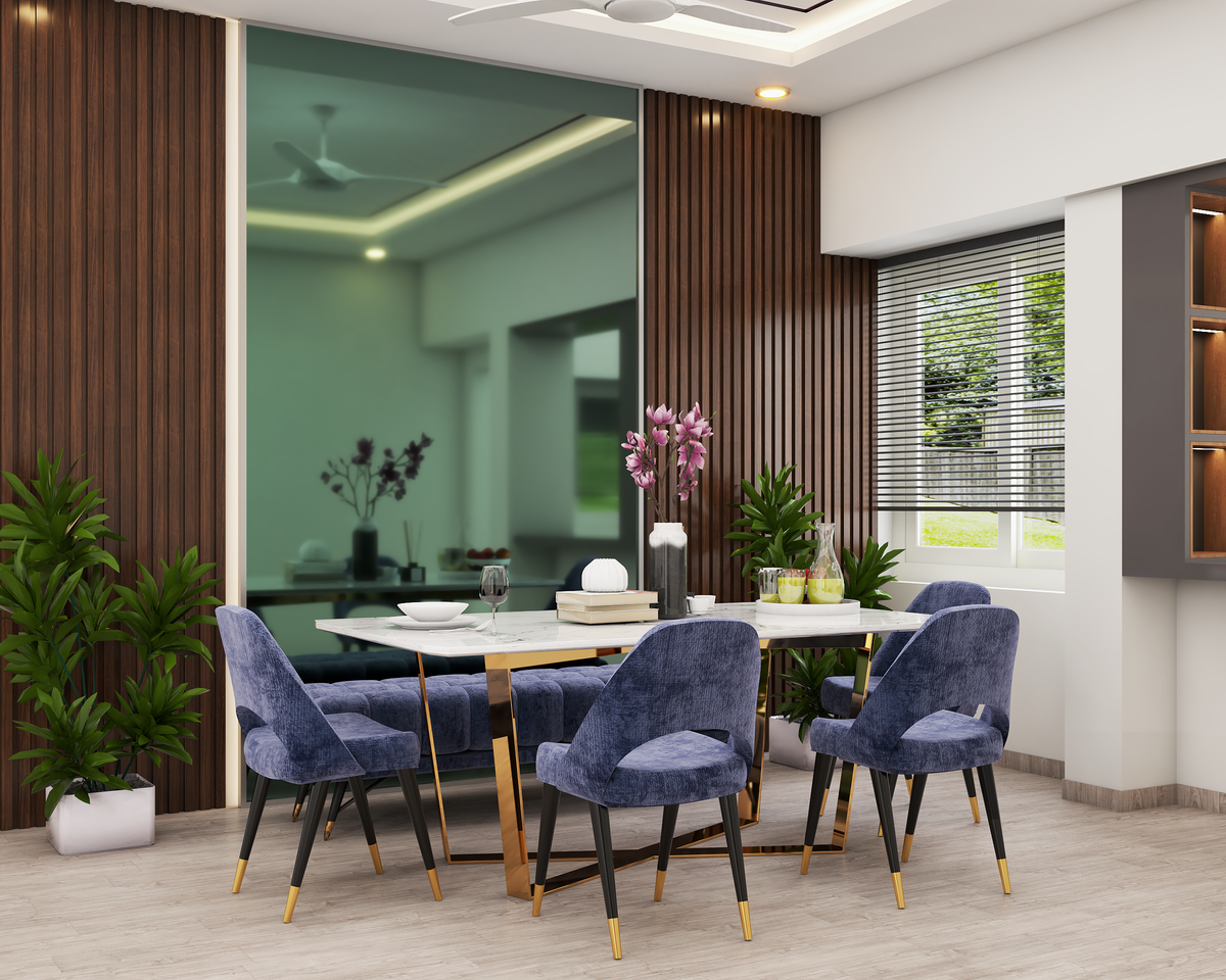 Spacious Dining Room Design With Mirror And Blue Tufted Chairs | Livspace