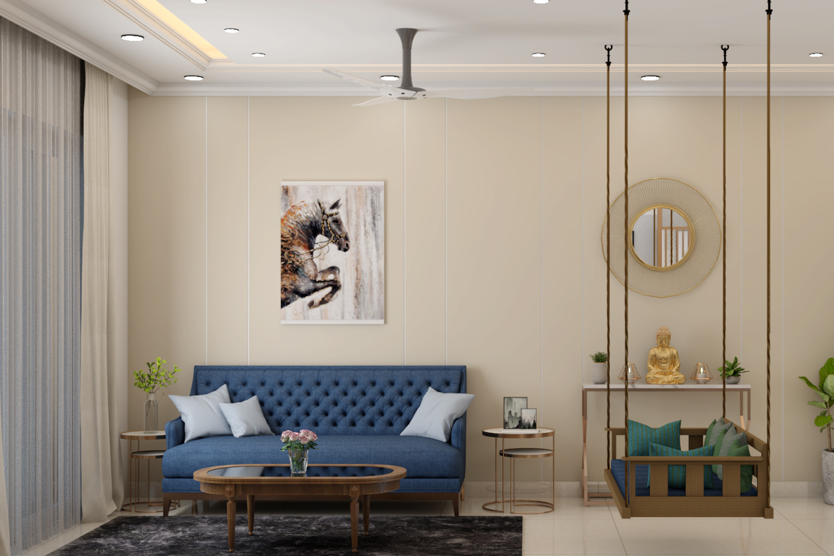 Spacious Living Room Design With Blue Sofa | Livspace