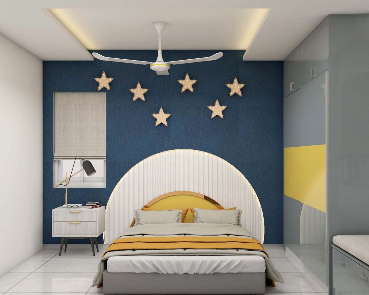 Boys Room Design With Dark Blue Accent Wall And Star Decor