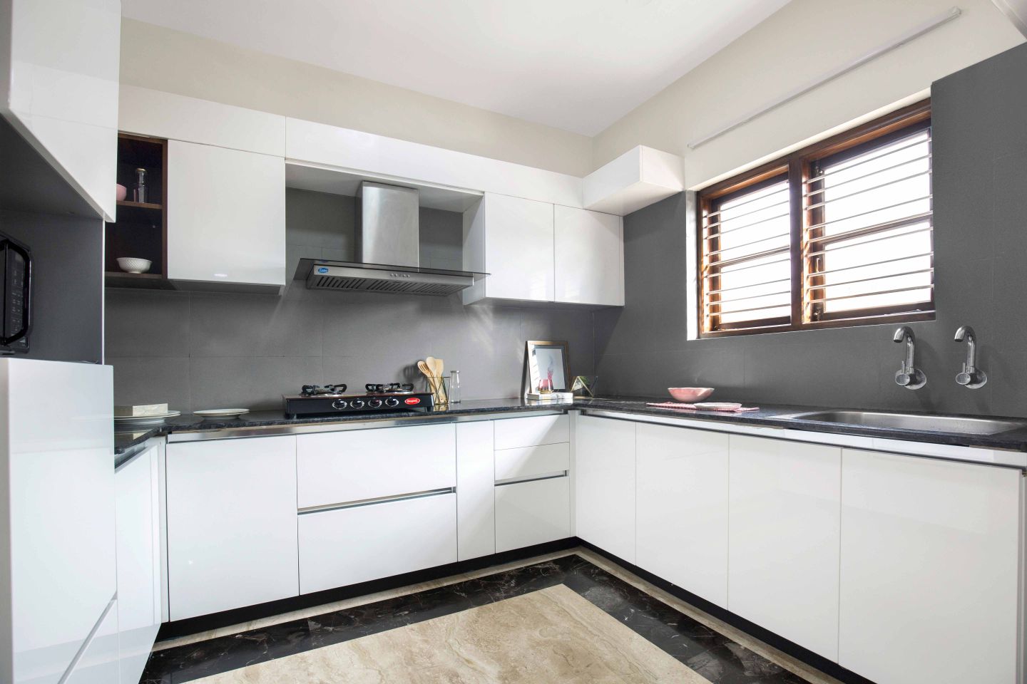 White And Grey U-Shaped Kitchen Design With Granite Countertop | Livspace