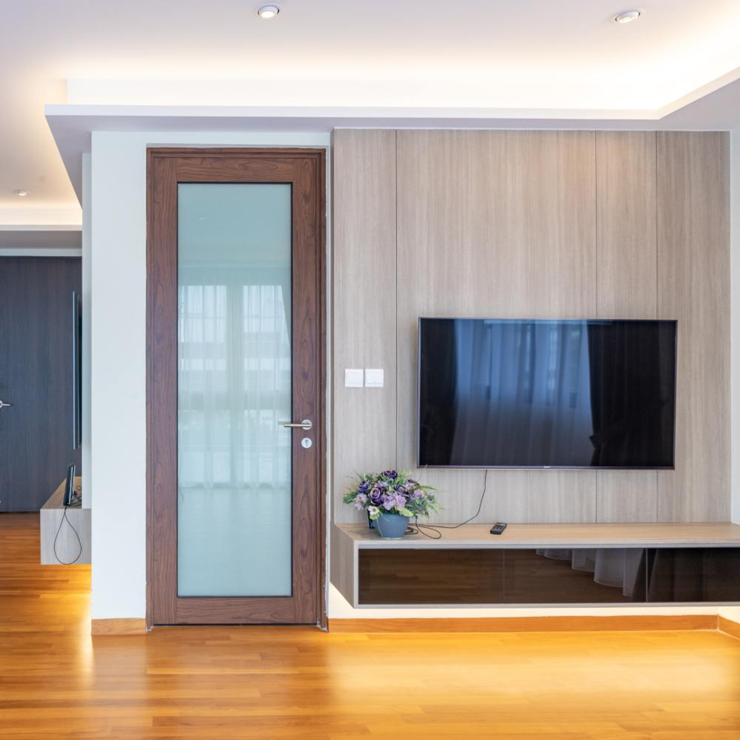 Wooden TV Design With A Glossy Finish Livspace