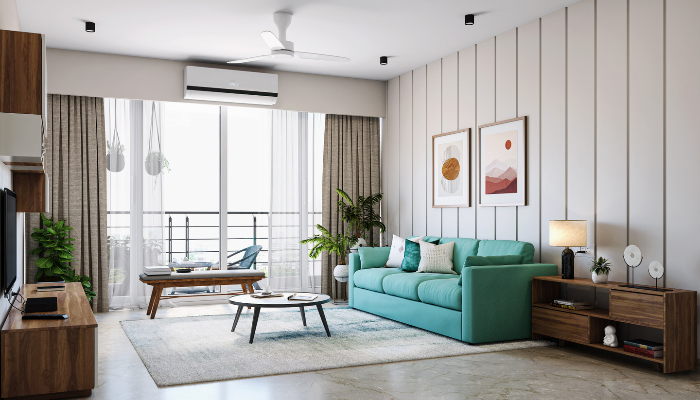 Spacious Living Room Design With A Green Sofa | Livspace