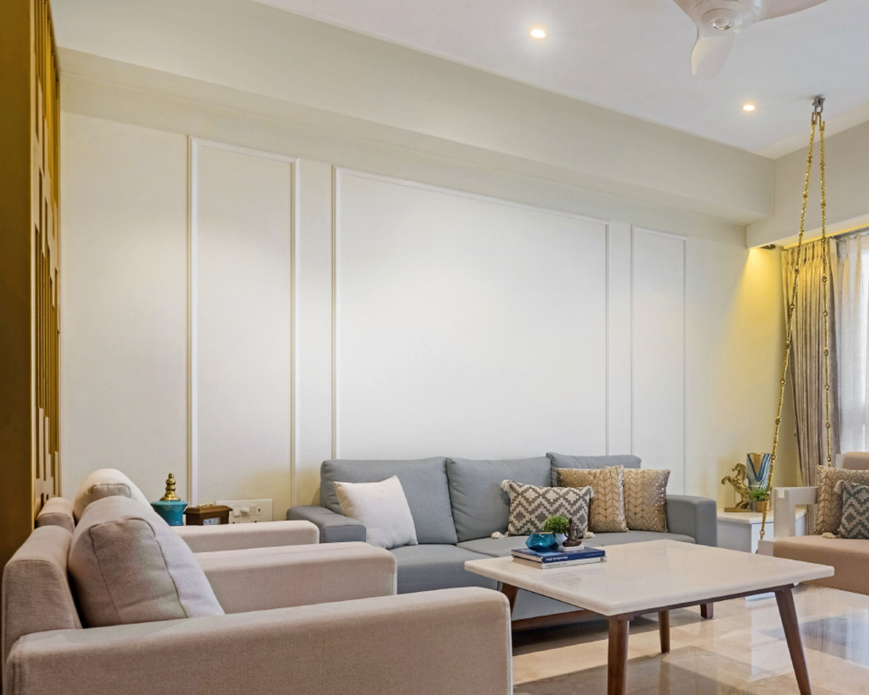 LightColoured Living Room Wall Paint With Wall Trims Livspace