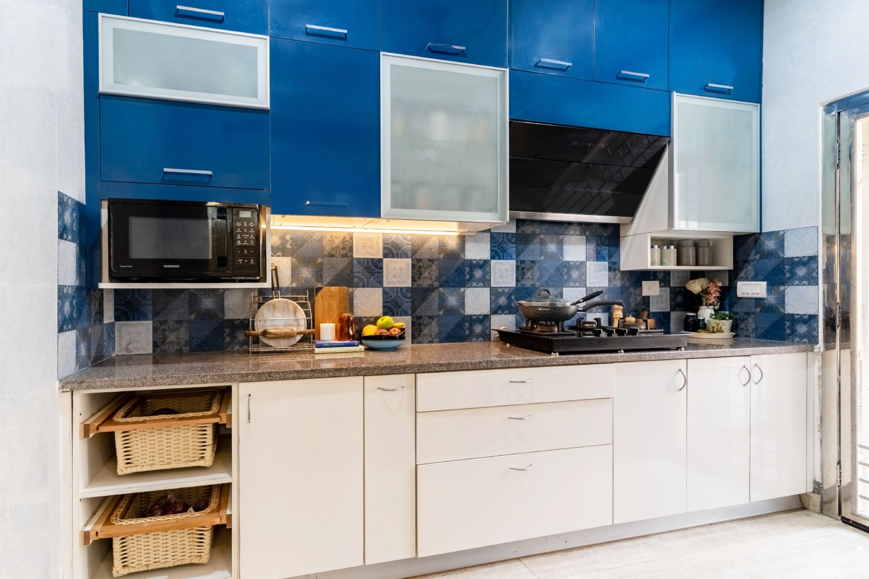 Modular Kitchen Design With Blue And White Dado Tiles | Livspace