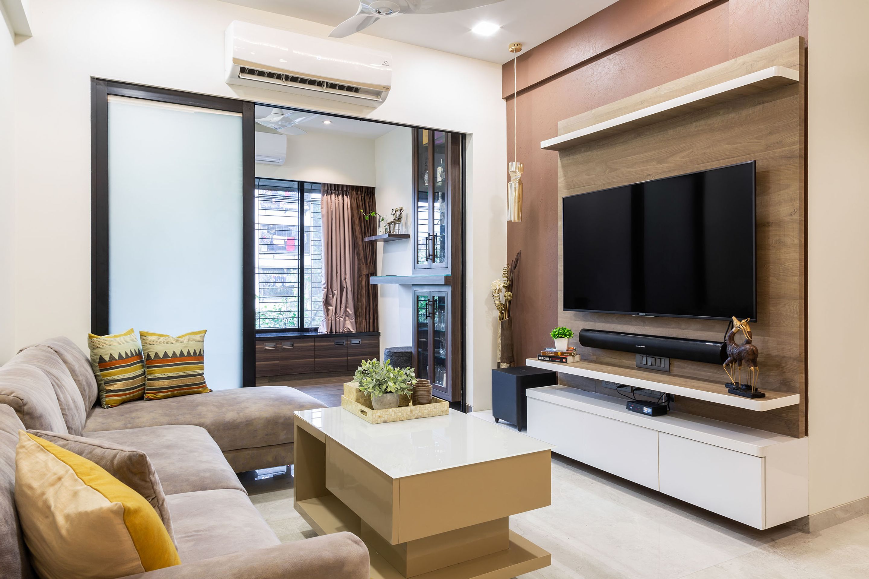 Brown Living Room Wall Paint For TV Unit | Livspace