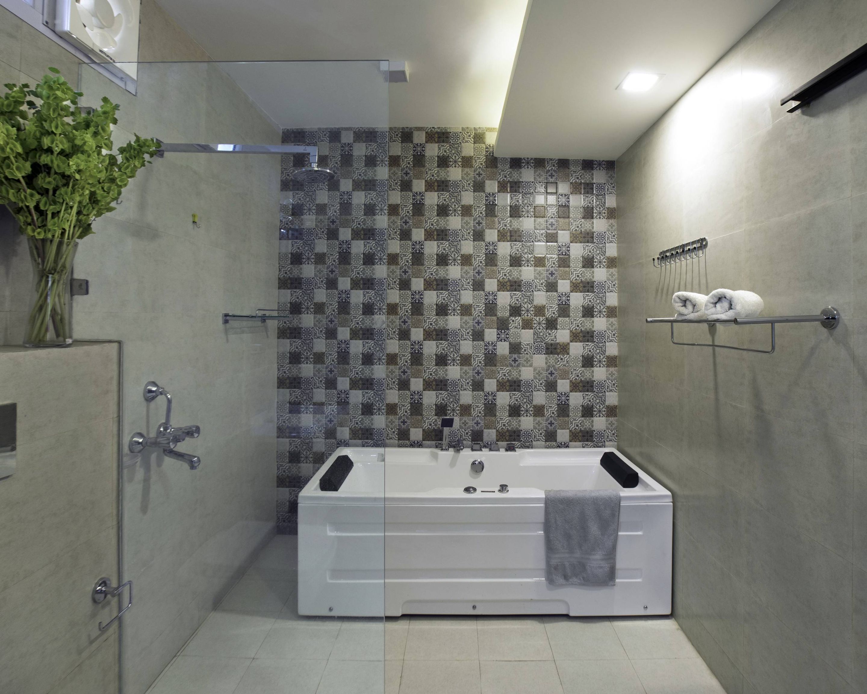 Spacious Grey Bathroom Design With Patterned Tiles | Livspace