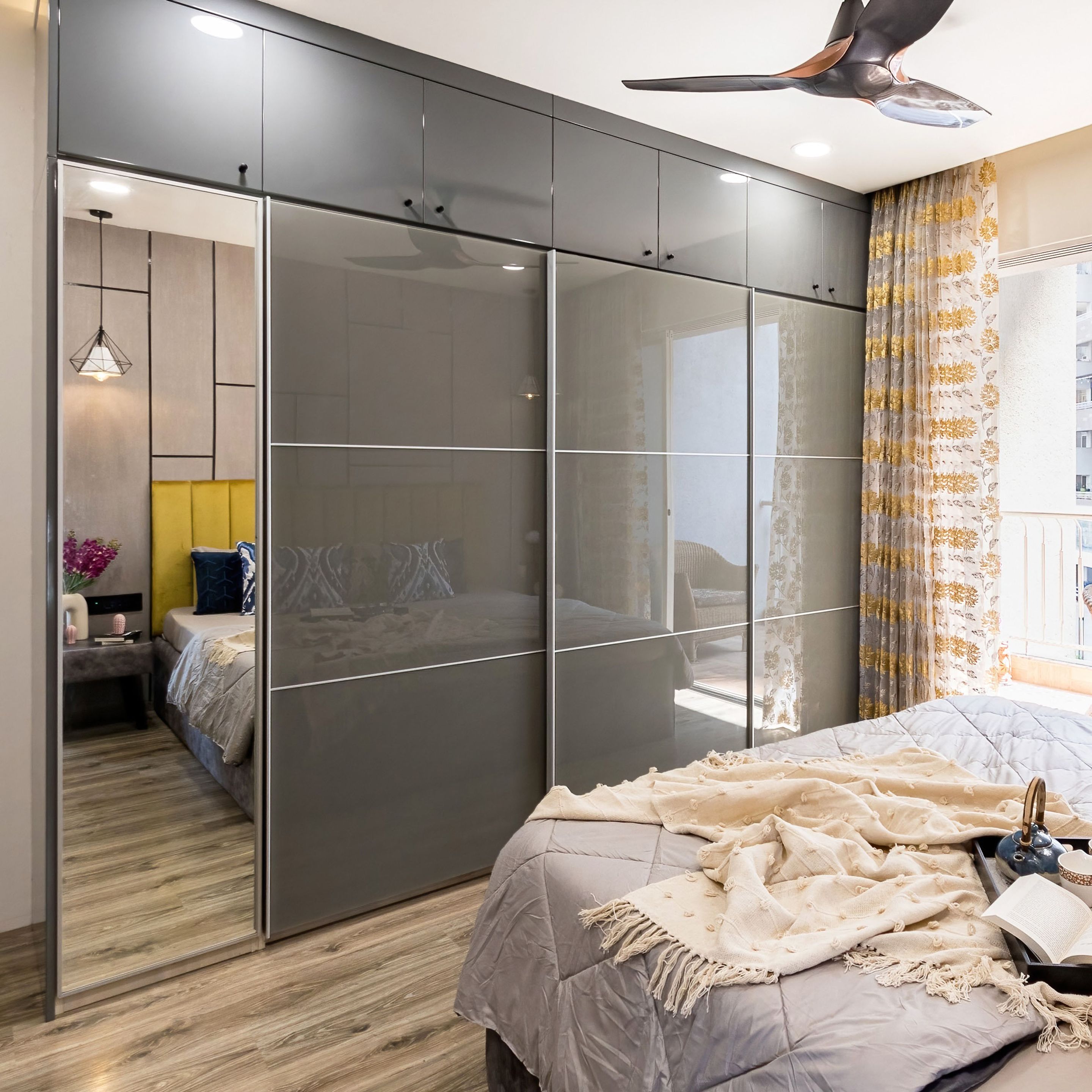 Grey And Silver Frost Sliding Door Wardrobe Design With Integrated Mirror Livspace 8590