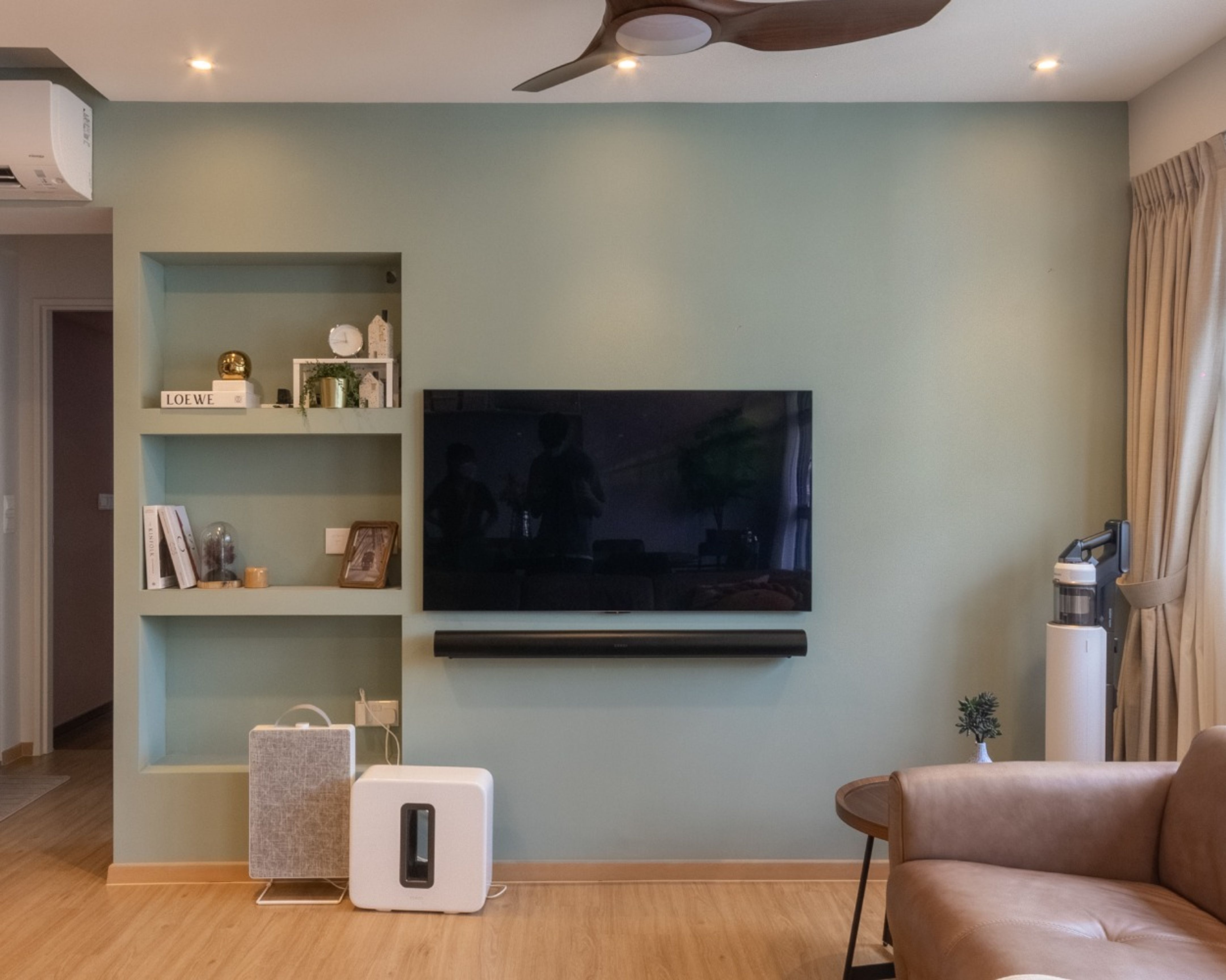 Modern Green TV Unit Design With Wall Niches | Livspace