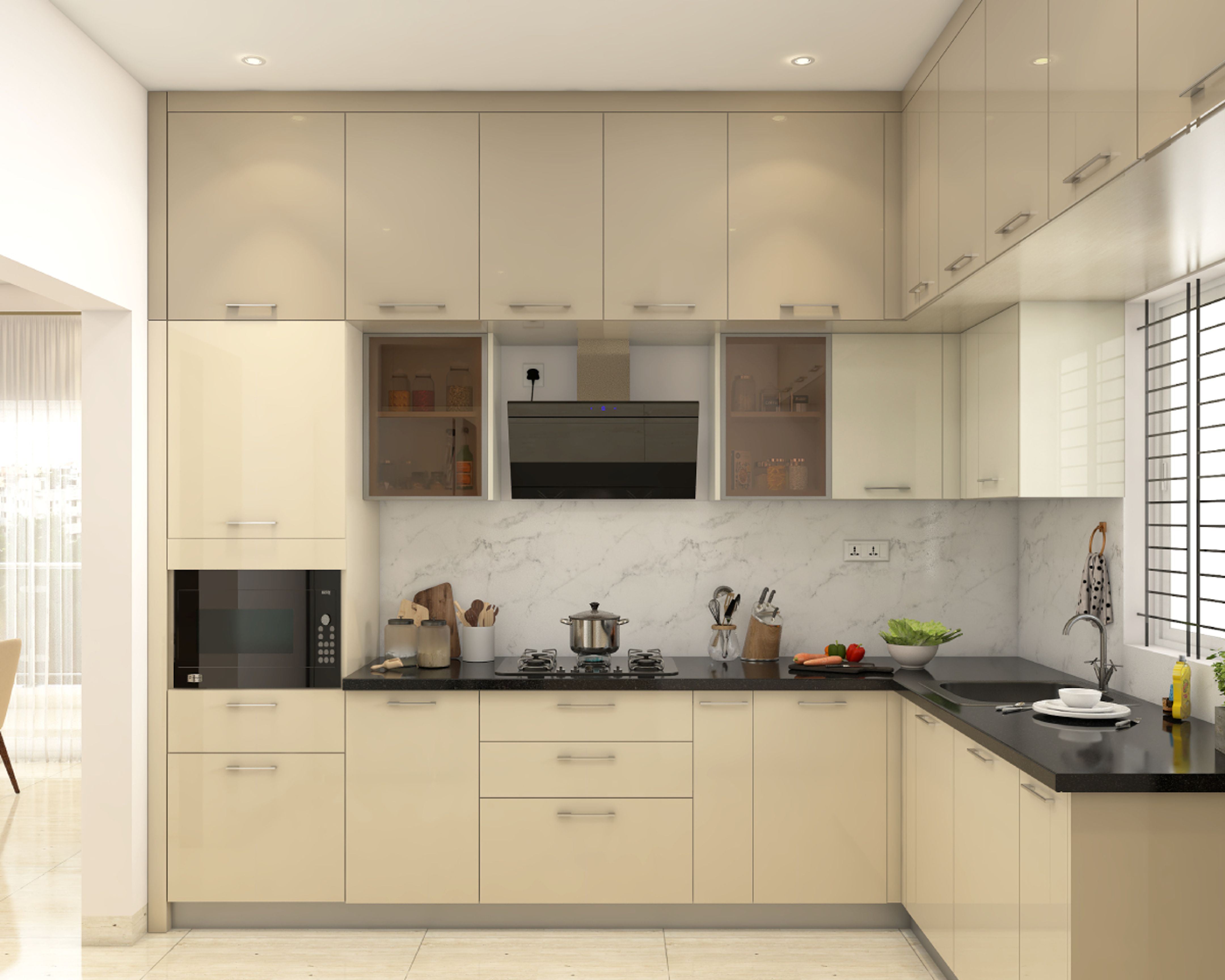 Compact L-Shaped Kitchen Design With Black Countertop | Livspace