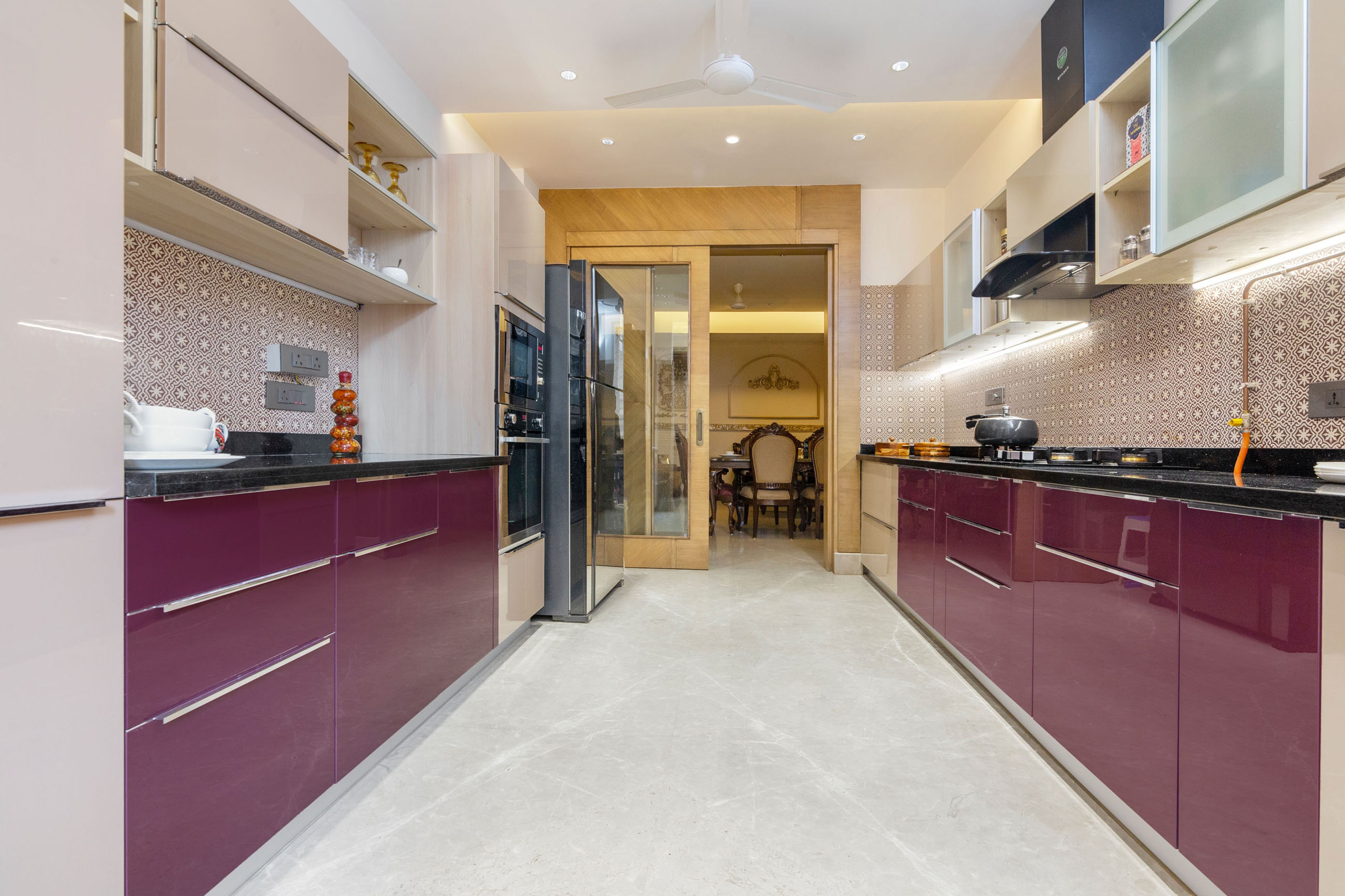 View of Stylish Parallel Kitchen Design with Aubergine and Light Beige Base ...