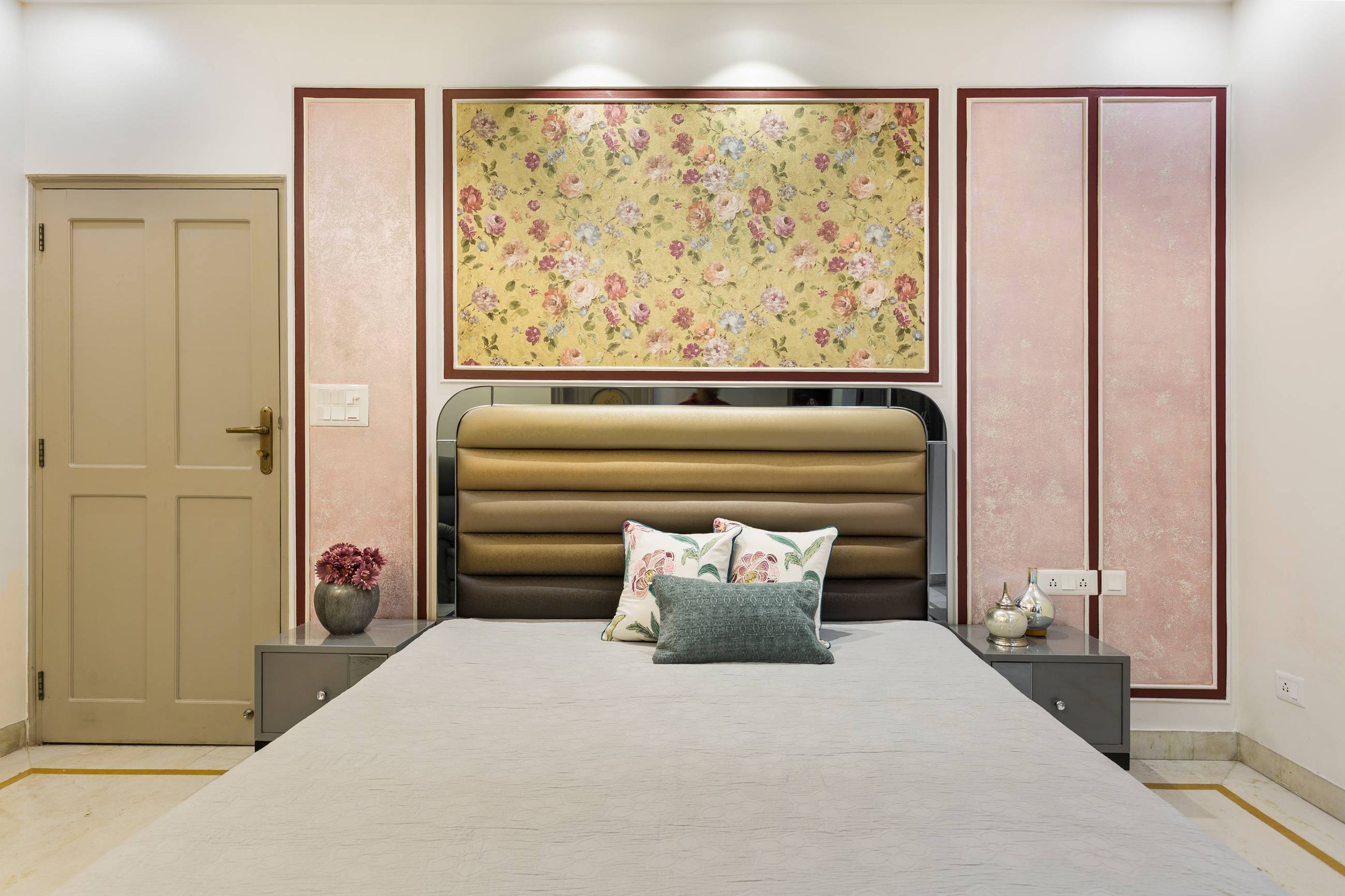 Spacious Guest Room Design With Pink Panelling And Floral Accent Wall ...