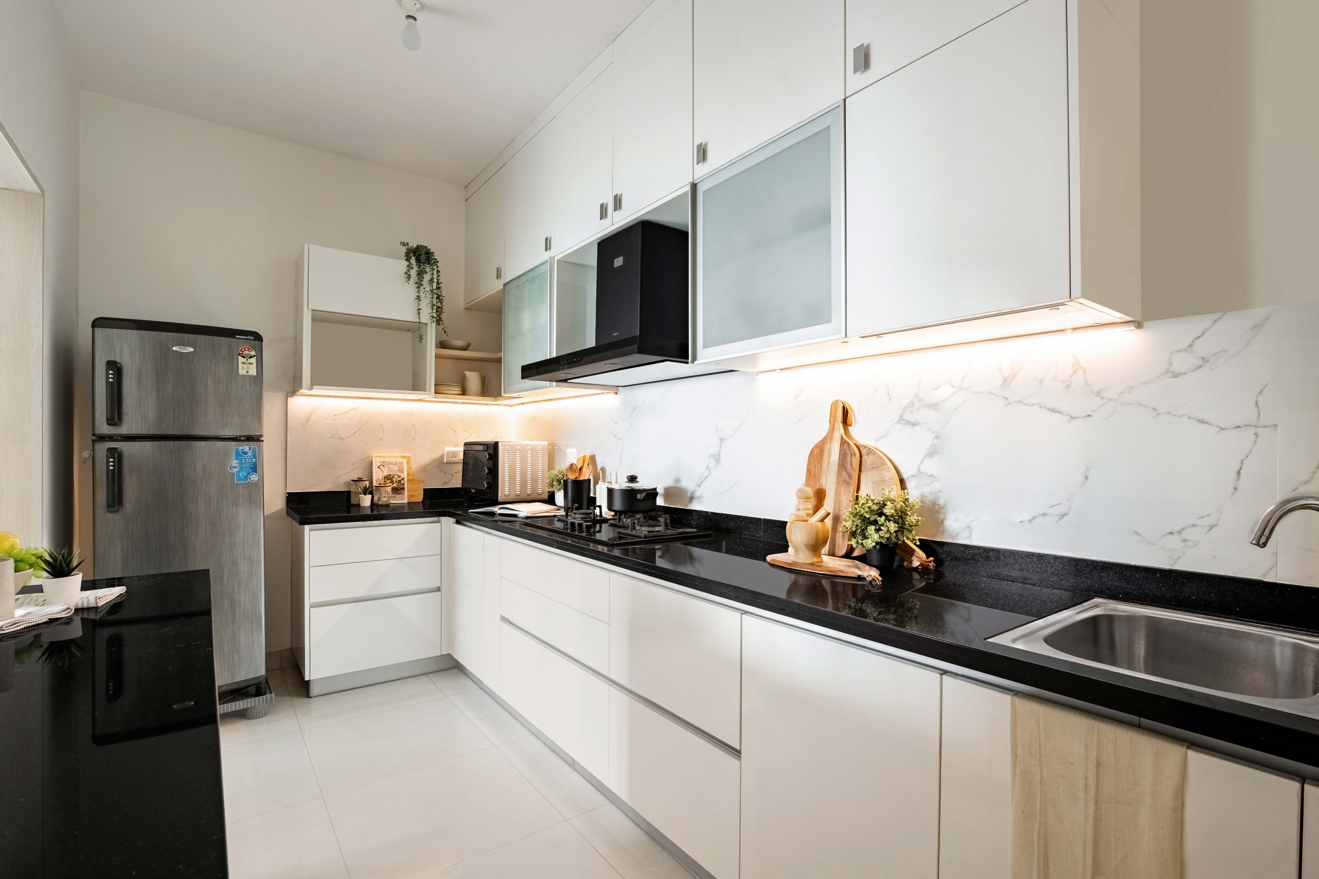L-Shaped Kitchen Design With A Granite Countertop | Livspace