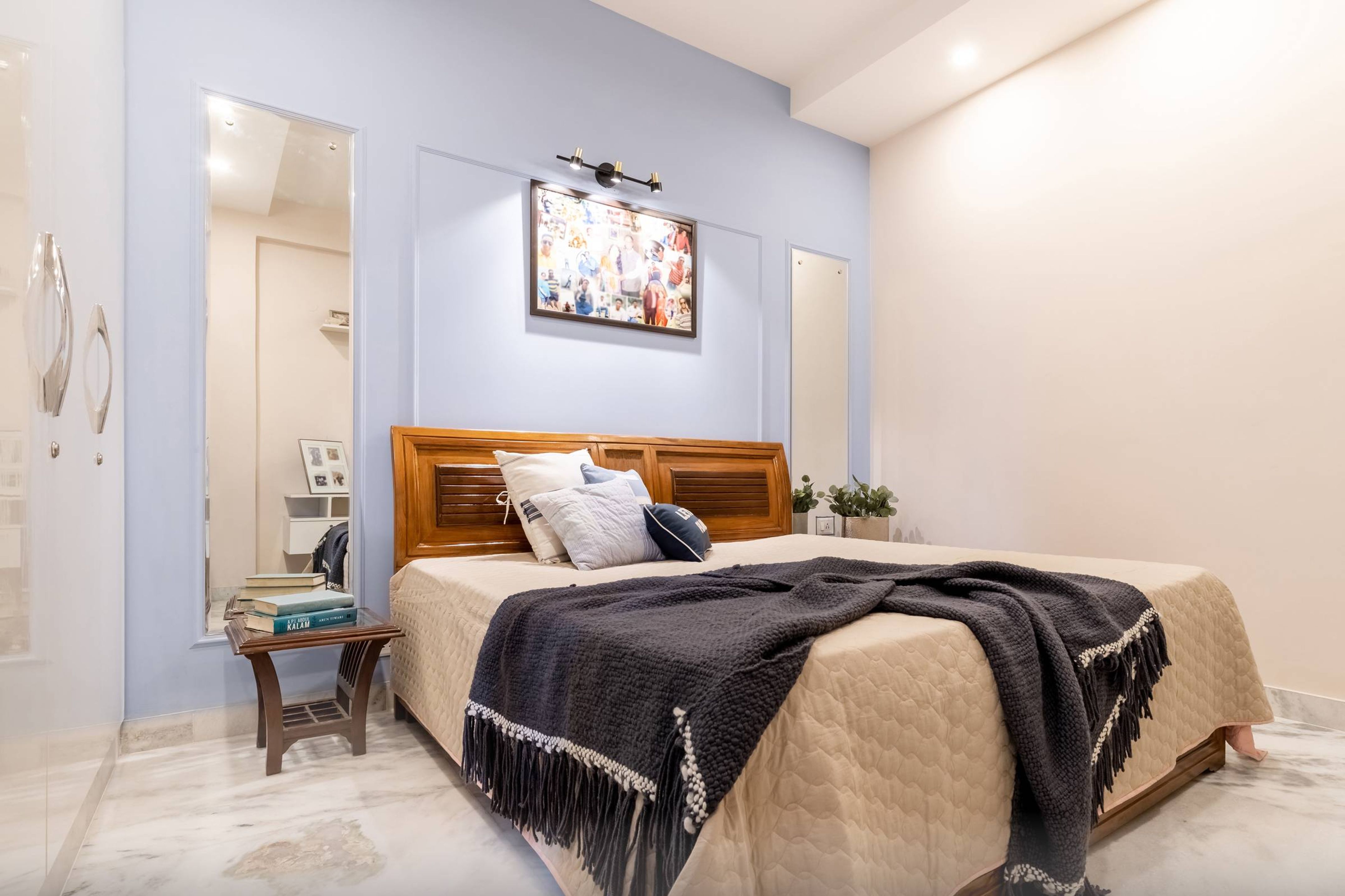Master Bedroom Design With Light Blue Wall Paint And Trims | Livspace