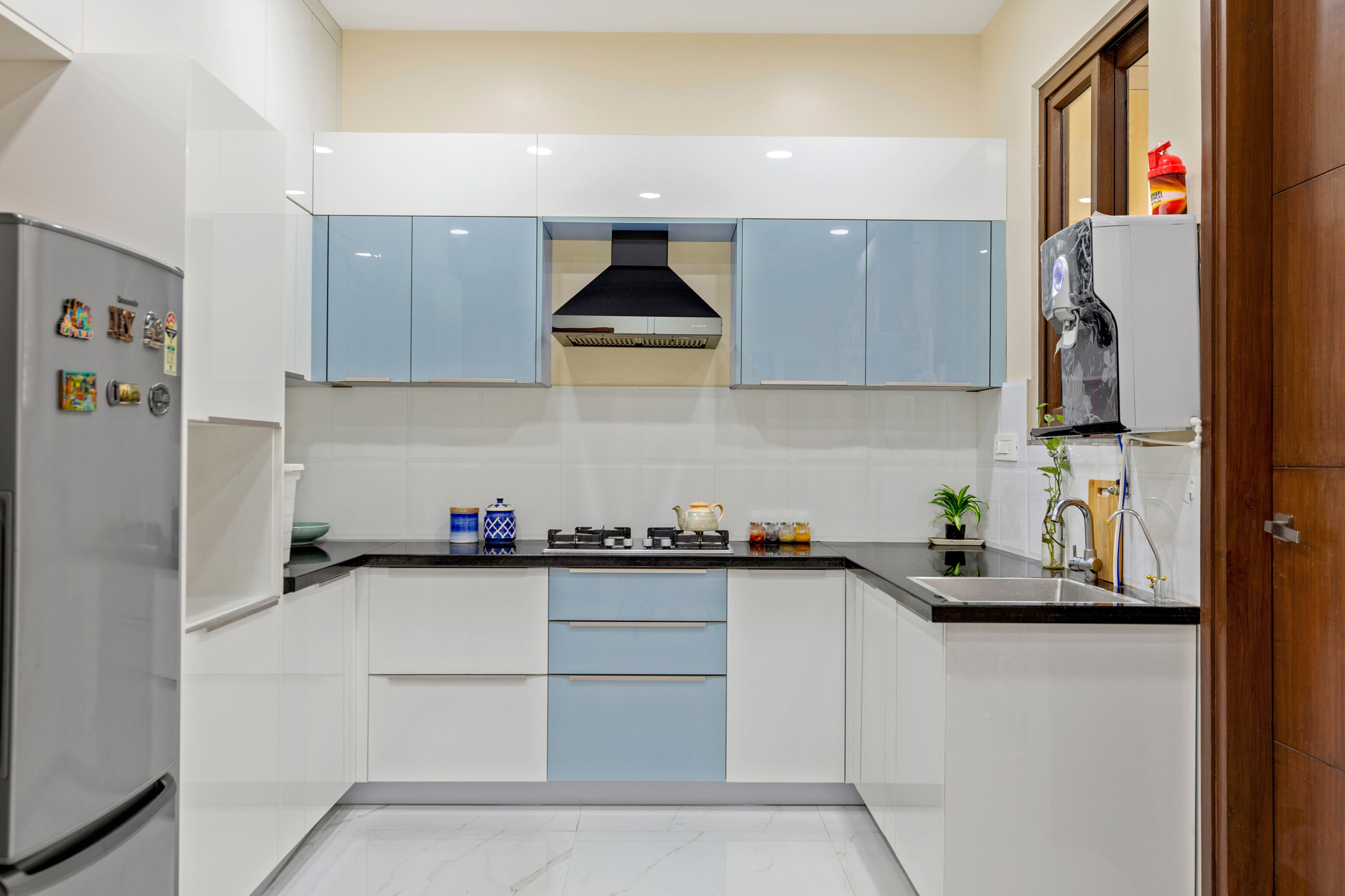 U-Shaped Blue And White Kitchen Cabinet Design With Granite Countertop ...