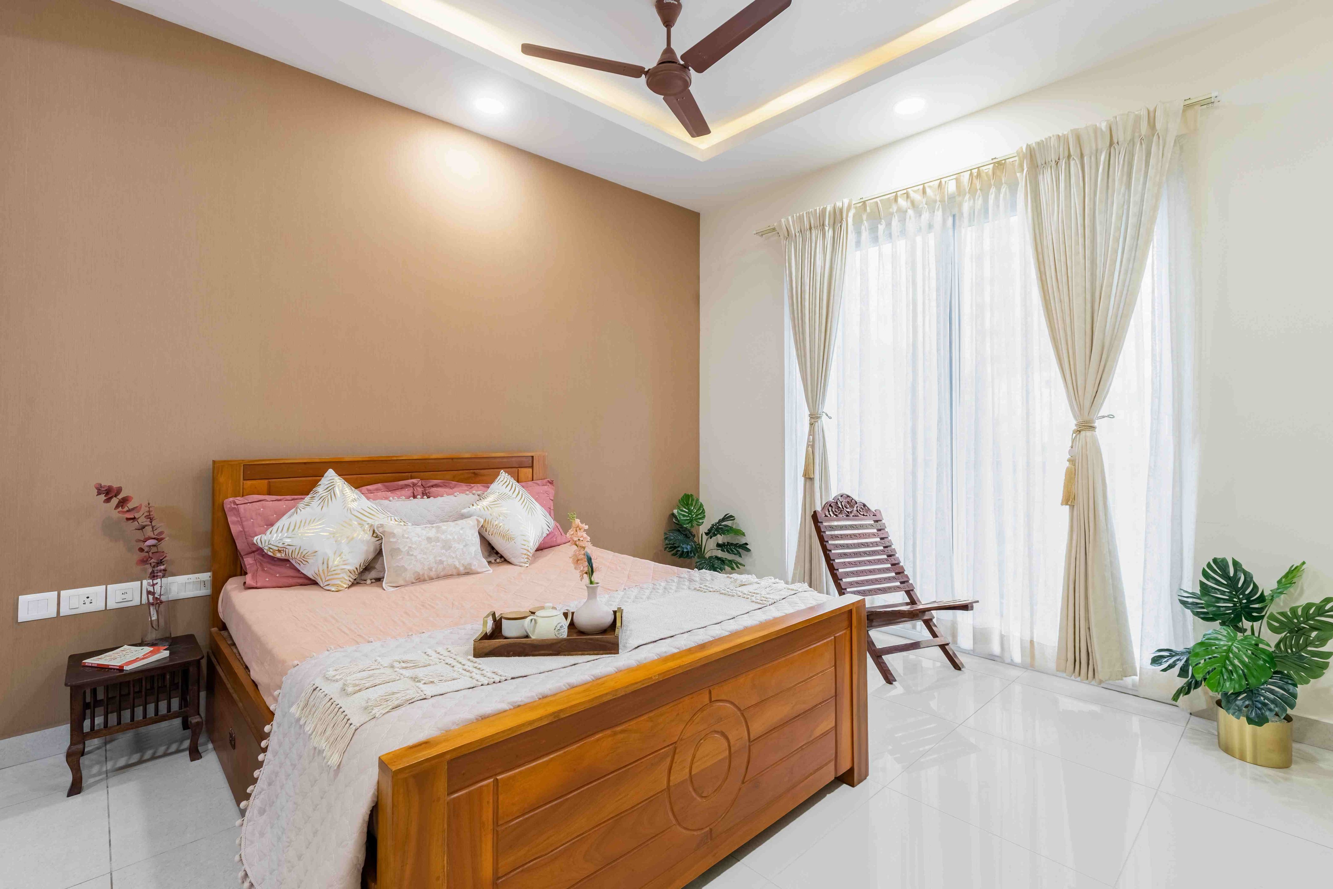 Spacious Bedroom Design With A False Ceiling With Cove Lights Livspace